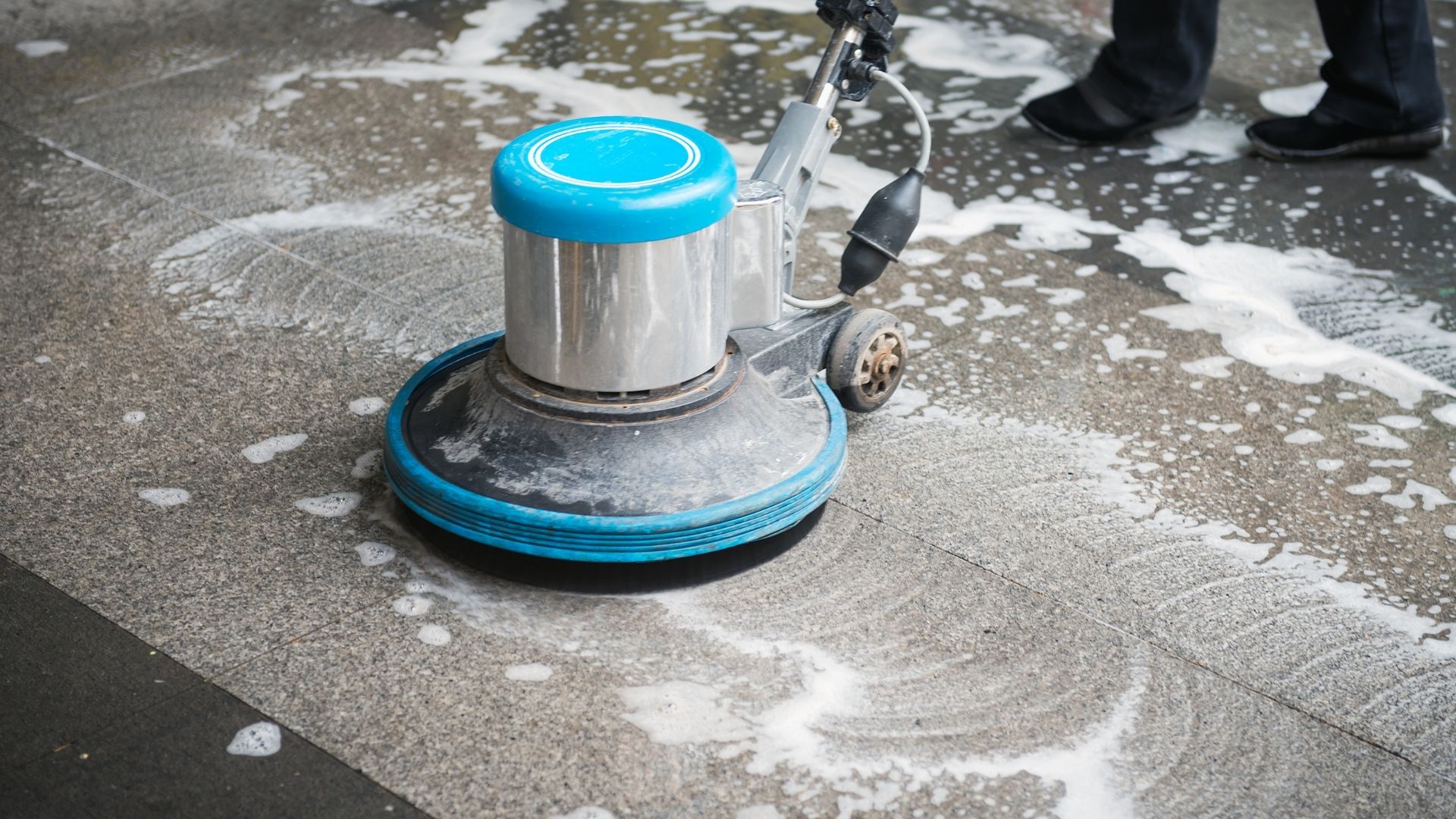 Floor machine cleaning hard surface